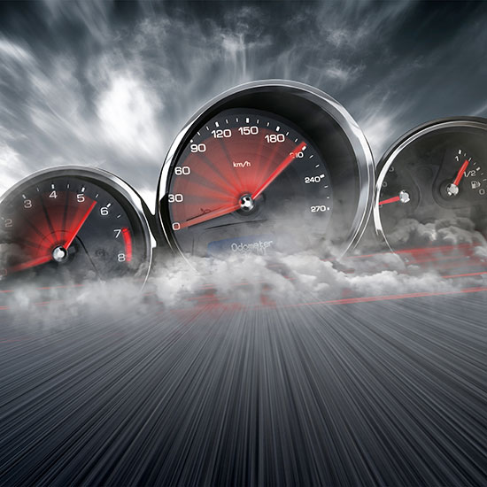 Could a License Plate Move the Needle on Customer Satisfaction? A dynamic image of three car gauges, including a speedometer, amid clouds and motion blur, conveying high speed and intensity.